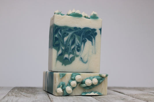 This gorgeous Lily of the Valley Soap has little white flowers piped on the top. The inside of this soap is two toned green swirls.