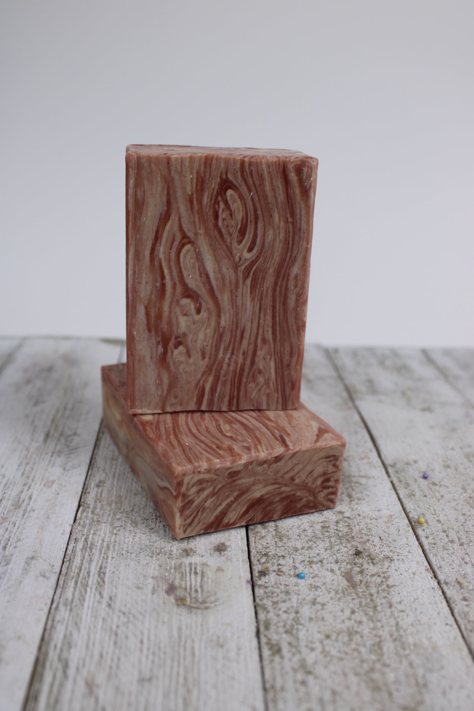 This Cherrywood soap bar shows the markings of what a piece of wood might look like.